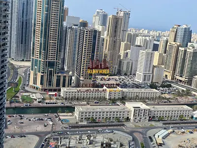 1BR apartment in Al Taawun with balcony & Al Qasba view, master room, 2 baths & parking. Rent AED 44,000.