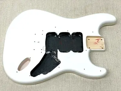 White Strat-style electric guitar body — pre-routed, needs neck  hardware. Has sticker residue