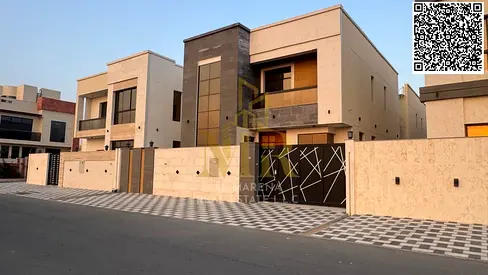 A stunning villa in Al Yasmin, featuring 5 master bedrooms, a majlis (formal sitting room), a living room, a kitchen, and a maid's room. The price inc
