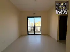 For rent first tenant in Al Alia Ajman near Sharjah &amp; Dubai exit, 1BR hall 2 bath balcony new bu