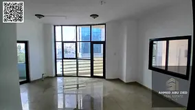 Two-bedroom apartment with a living room and balcony for annual rent on Al Ittihad Street – prime 