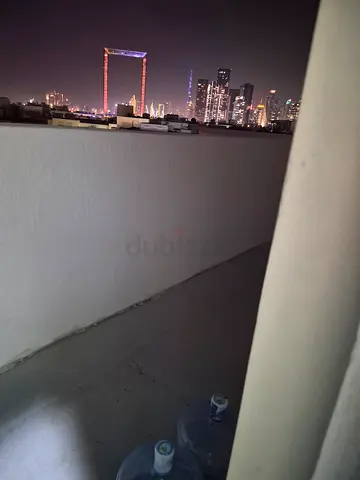 Room with attached washroom in karama for a single lady (or 2)