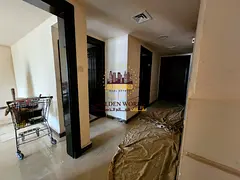 Rental opportunity in Al Taawun: 2-bedroom apartment with a small balcony, 2 bathrooms, built-in war