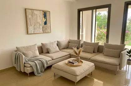 L-shape sofa set Ottoman included Neutral beach tone, modern look