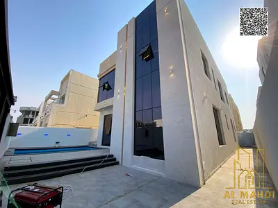 فيلا للبيع بعجمان الحليو 2 بمسبح خاص 5 غرف ماستر تكييف مركزي تملك حر شامل رسوم التسجيل وتمويل حتى 25 سنة
