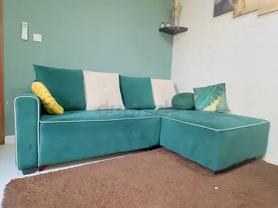 L shaped sofa with cushions for sale