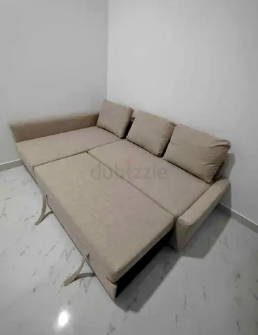 Ikea L Shape Sofa cum bed with big storage in L