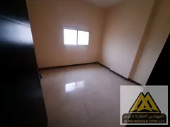 Two-bedroom apartment with a closed living room and balcony in Al Jurf Industrial Area 3, priced at