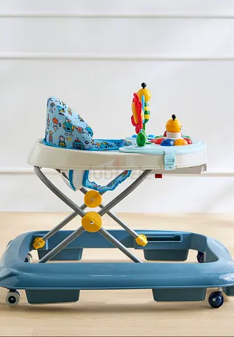 My blue baby walker with activity tray and toys - good condition