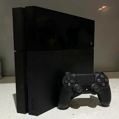 Sony PlayStation 4 Console with Controller + fifa 26 cd + gta 5 inside ps4