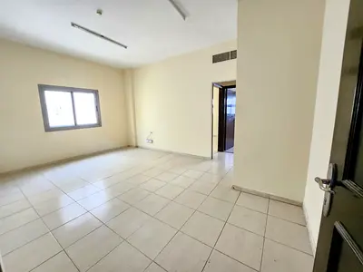 AMAZING 1BHK ON ROAD BUILDING PRIME LOCATION IN MUWAILEH