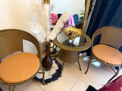 Set of 2 rattan wicker chairs with matching glass-top side table