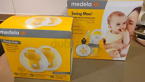 Medela Swing Maxi Double Pump and free swing pump, used once only