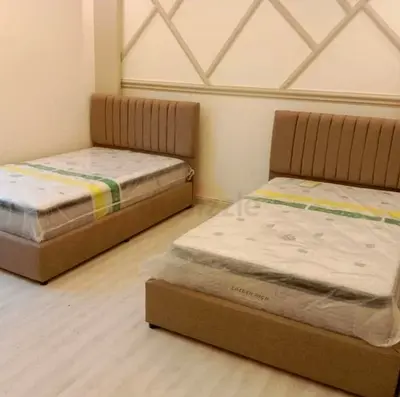 Two single upholstered beds with mattresses (beige)