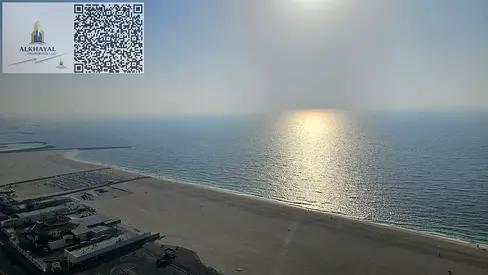 For annual rent in Ajman, Corniche Residence Towers, sea view, two-bedroom apartment with a living
