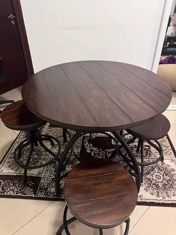 Round wooden bar table with 4 matching stools (height adjustable)