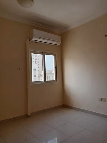Family one bedroom and living room apartment with two bathrooms in Al Nabba Sharjah in a family only building close to all services
