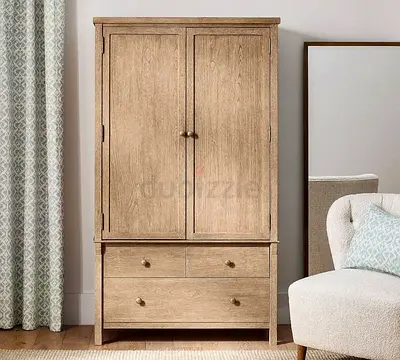 Selling high quality Pottery Barn Toulouse Armoire cabinet for sale great condition neat and clean