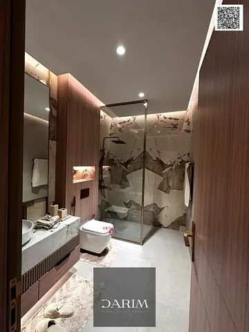 Fully furnished 1-BR apartment in Tiger Downtown, Ajman. 1,050 sq.ft of modern living space, high floor, and open views. Price: AED 598,400 after a 30