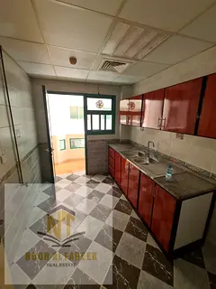 Al Qasimiya Al Mahatta apartment has two rooms, a hall, two bathrooms, and a balcony, without admini