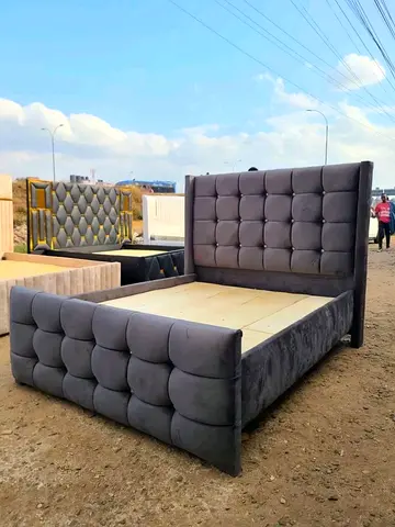 Stylish Grey Fabric Bed with Plush Headboard