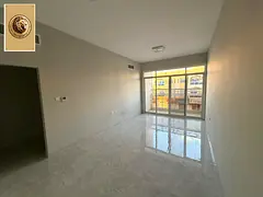 For Rent in Ajman - Al Rawda 3 Prime location near Sheikh Ammar Street Spacious 2-bedroom apartment