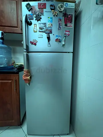 White double-door refrigerator — good working condition