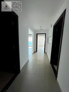 One bedroom and living room for sale in Corniche Tower, partial sea view.