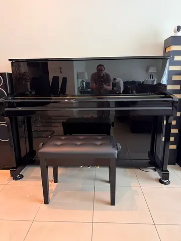 Stylish Black Piano with Bench