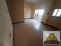 Two-bedroom apartment with a closed living room and balcony in Al Jurf Industrial Area 3, priced at