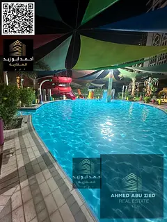 1BHK Annual Rent in Ajman – Al Rashidiya 1 | With Gym, Pool, Aqua Park &amp; Parking | 2 Bathrooms