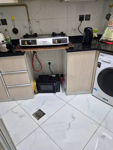 Room with attached washroom in karama for a single lady (or 2 working ladies from same family)
