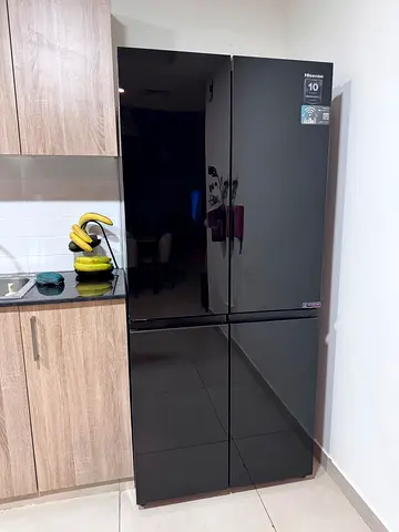 Black 4-door refrigerator Buy a month ago with invoice and guarantee
