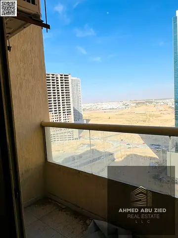 2BR apartment in Emirates City | 2 bedrooms (1 master) | 2 baths | Open-view balcony | Spacious layout | Close to all services