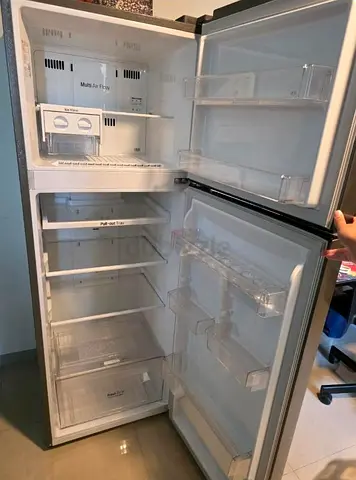 Im selling my top-freezer refrigerator — clean and working