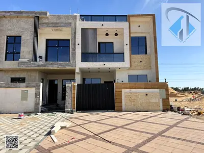 Three-story villa at a bargain price, including registration and ownership fees, on the main street, ready to move in, in one of Ajman's most prestigi