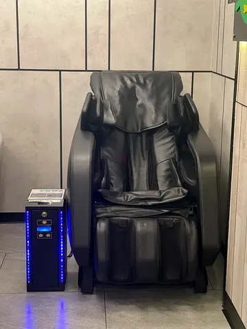 Massage chair with money box