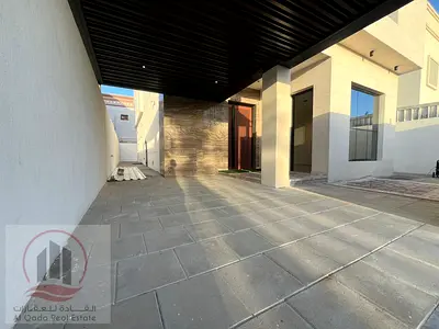 For sale, a villa in Ajman Al Mowaiha, 5 master rooms, a Majles room, a hall, and a maid’s room, freehold for all nationalities Including Sewage Fees