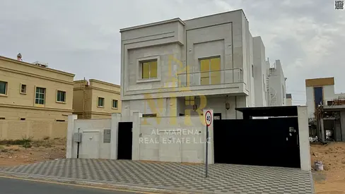 Distinctive villa for sale in Al Yasmin area – Ajman | 5 master bedrooms | Electricity and water included | Elegant outdoor seating area
