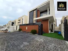 A luxurious villa with a modern design that combines tranquility, privacy, and easy access, located