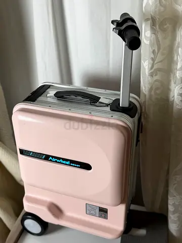 Compact Pink Airwheel Carry-On Roller Luggage (Good Condition)