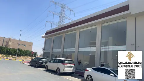Commercial Building for Sale in Al Helio 1, Ajman – Corner Plot Near Al Zubair Street | 5 Shops with Mezzanine | Freehold | Prime Location | AED 2M In