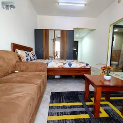 Furnished studio in Ajman with balcony, separate kitchen, creek view, spacious layout, prime locatio