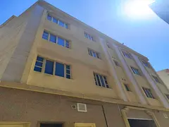 Building for sale in Muwaileh commercial area, with an area of ​​2900 square feet.
