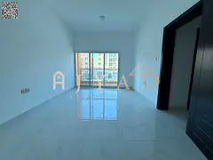 2BR apartment in Al Mowaihat 3, first tenant, balcony, 1 month free, 2 master rooms, 3 baths, centra