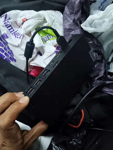 Portable multi‑port USB docking station (USB-A x4, HDMI, USB-C)