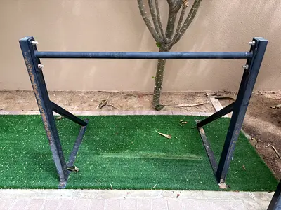 Used metal pull up bar - sturdy and needs to be mounted on the side of a villa. No screws included