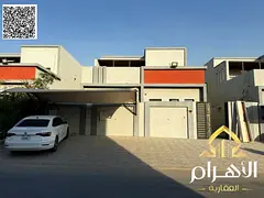 Ready-to-move-in villa with air conditioning, water, and electricity in Al Yasmin, directly behind t