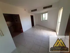 Studio for Annual Rent in Al Rashidiya 3, Ajman – Behind Grand Mall, Semi-Separate Kitchen &amp; B