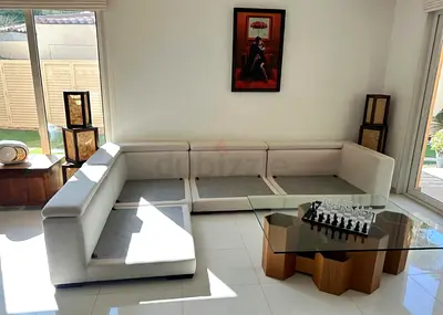 Samoa Feather filled sofa with footstool